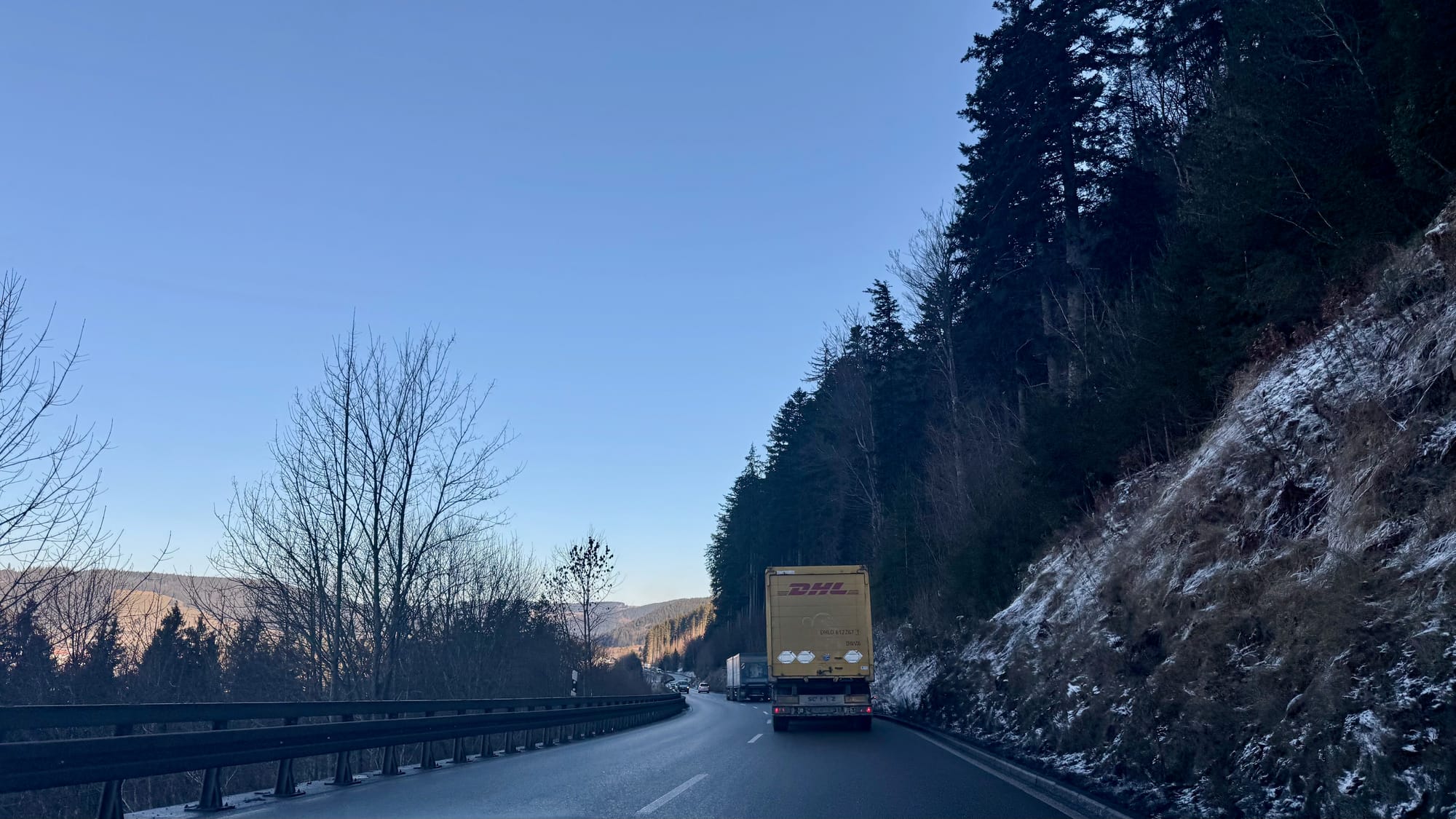 Behind trucks on the B500