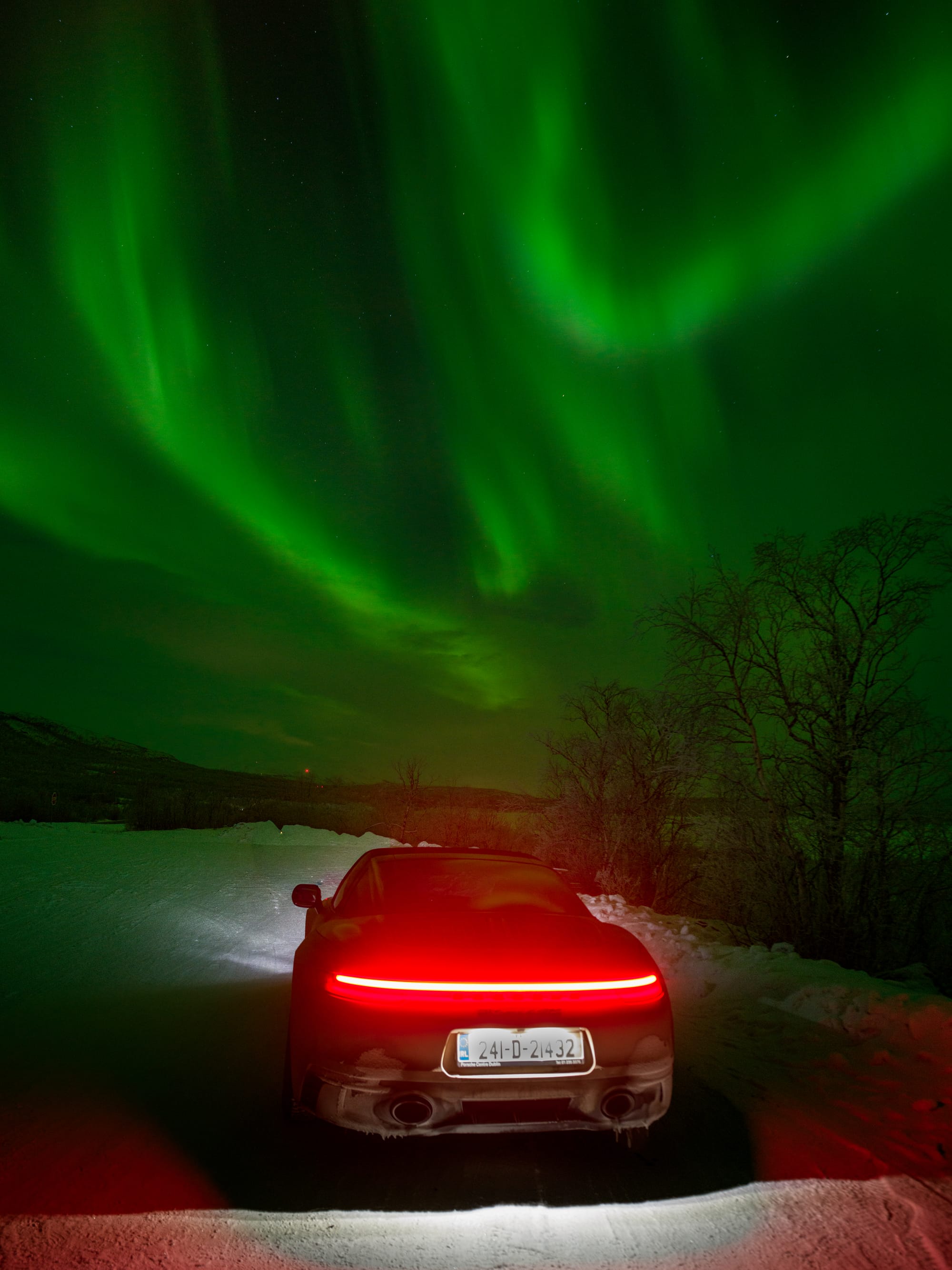 Northern lights over our Porsche 911 Targa