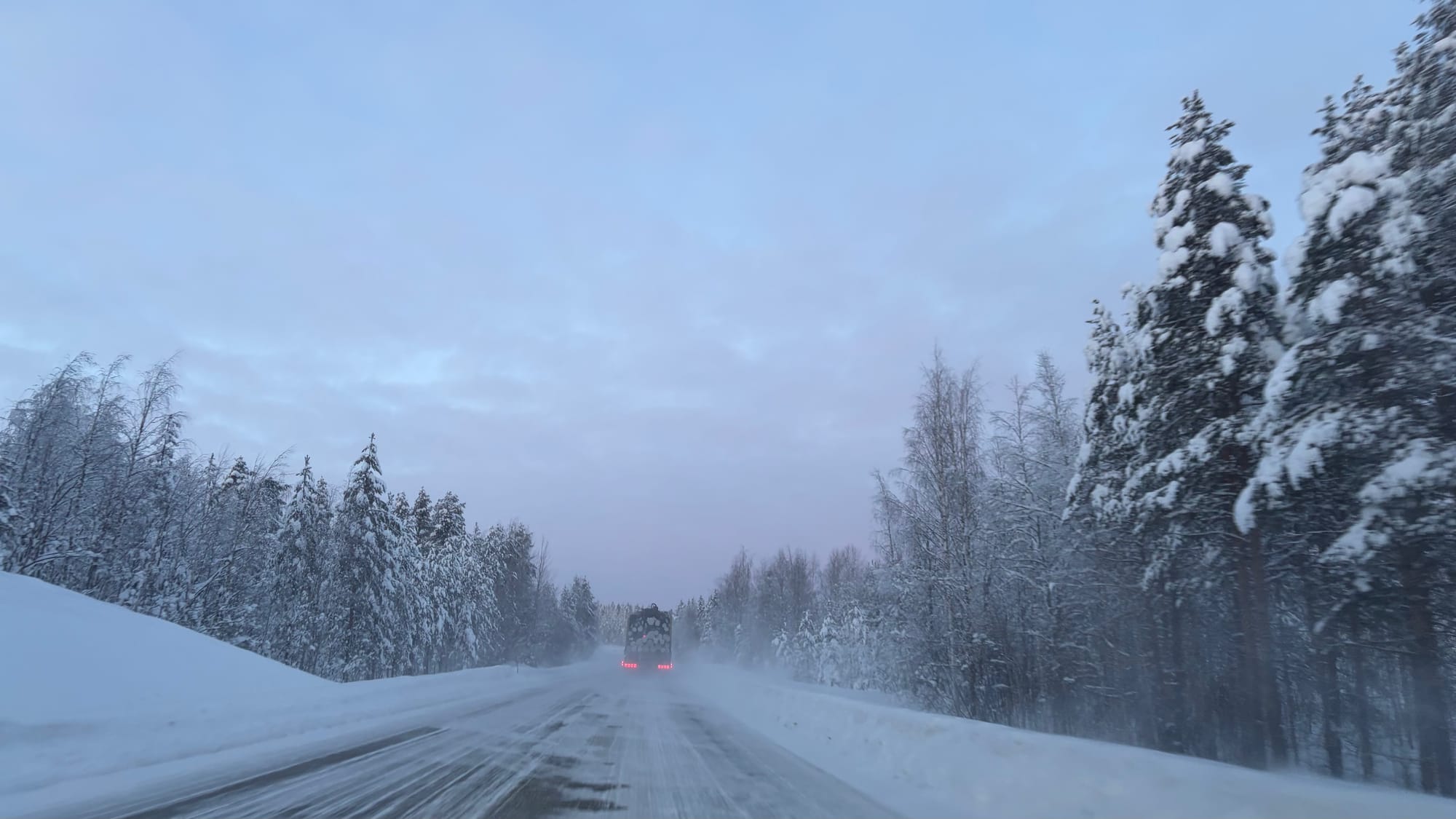 Stuck behind a logging truck