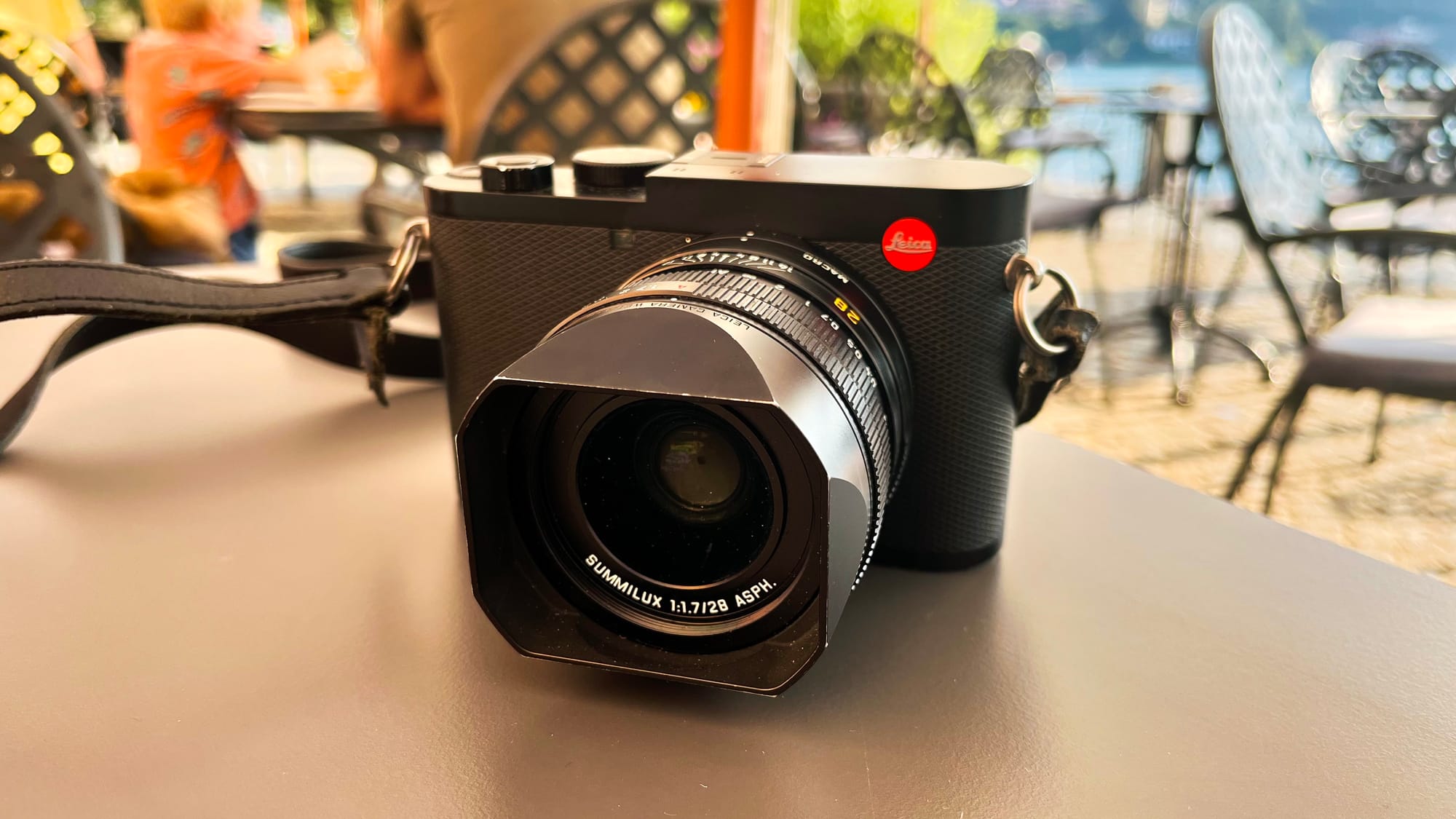 Our well worn Leica Q2 sitting on our lunch table
