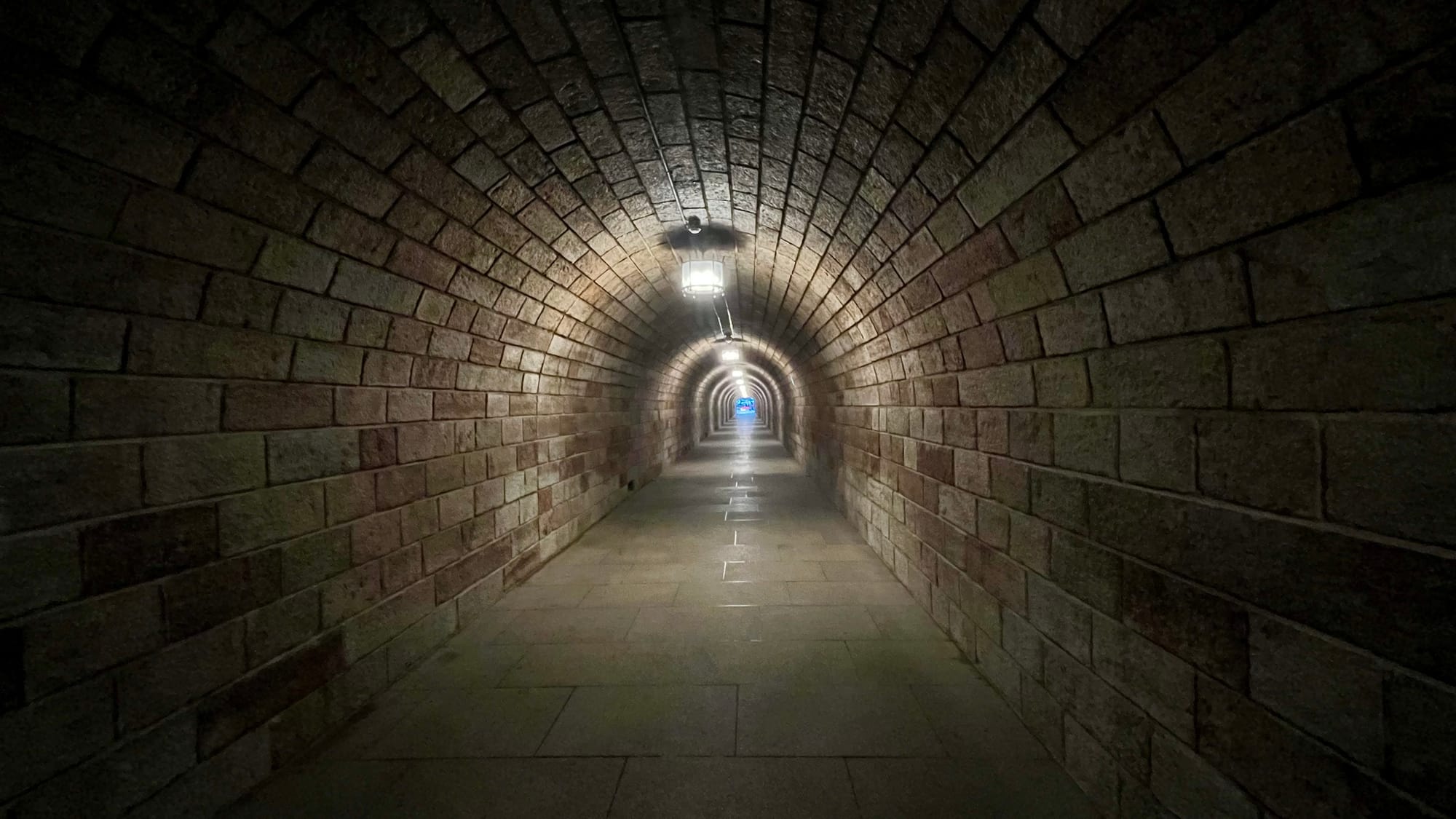 The long tunnel into the mountain to the brass elevator