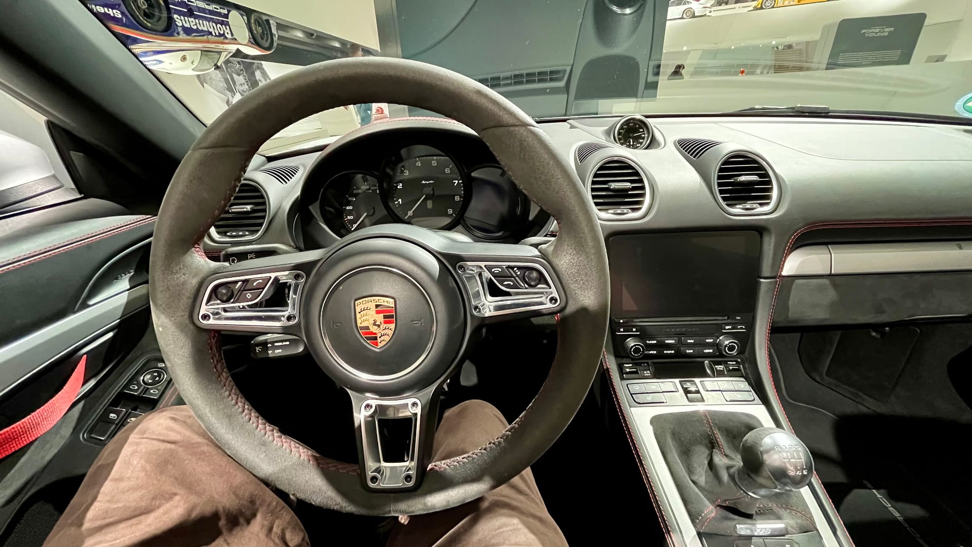 Sitting inside a 718 Spyder at the museum