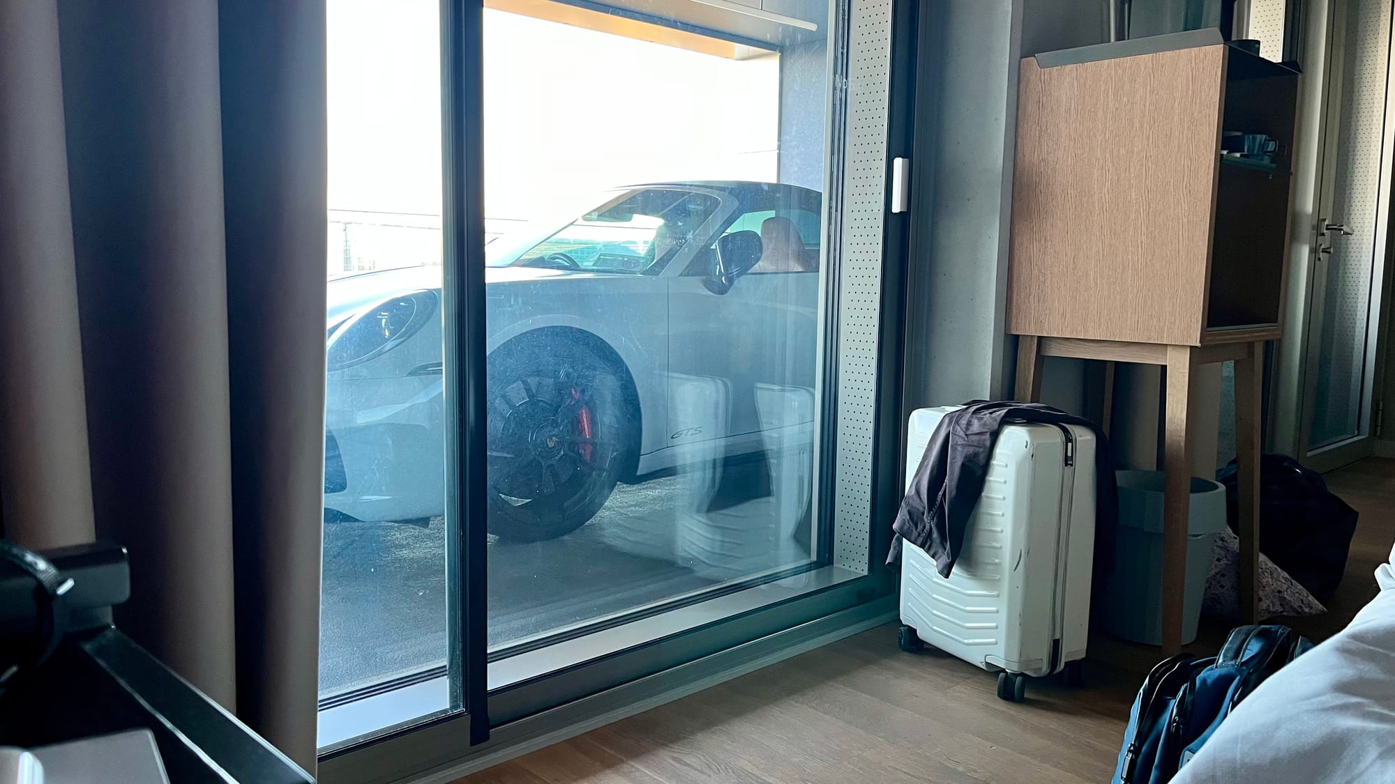 Looking out at our car on the balcony in the morning