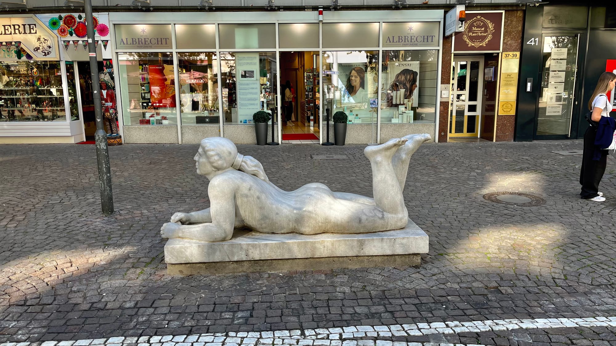 Statue outside the Porsche store