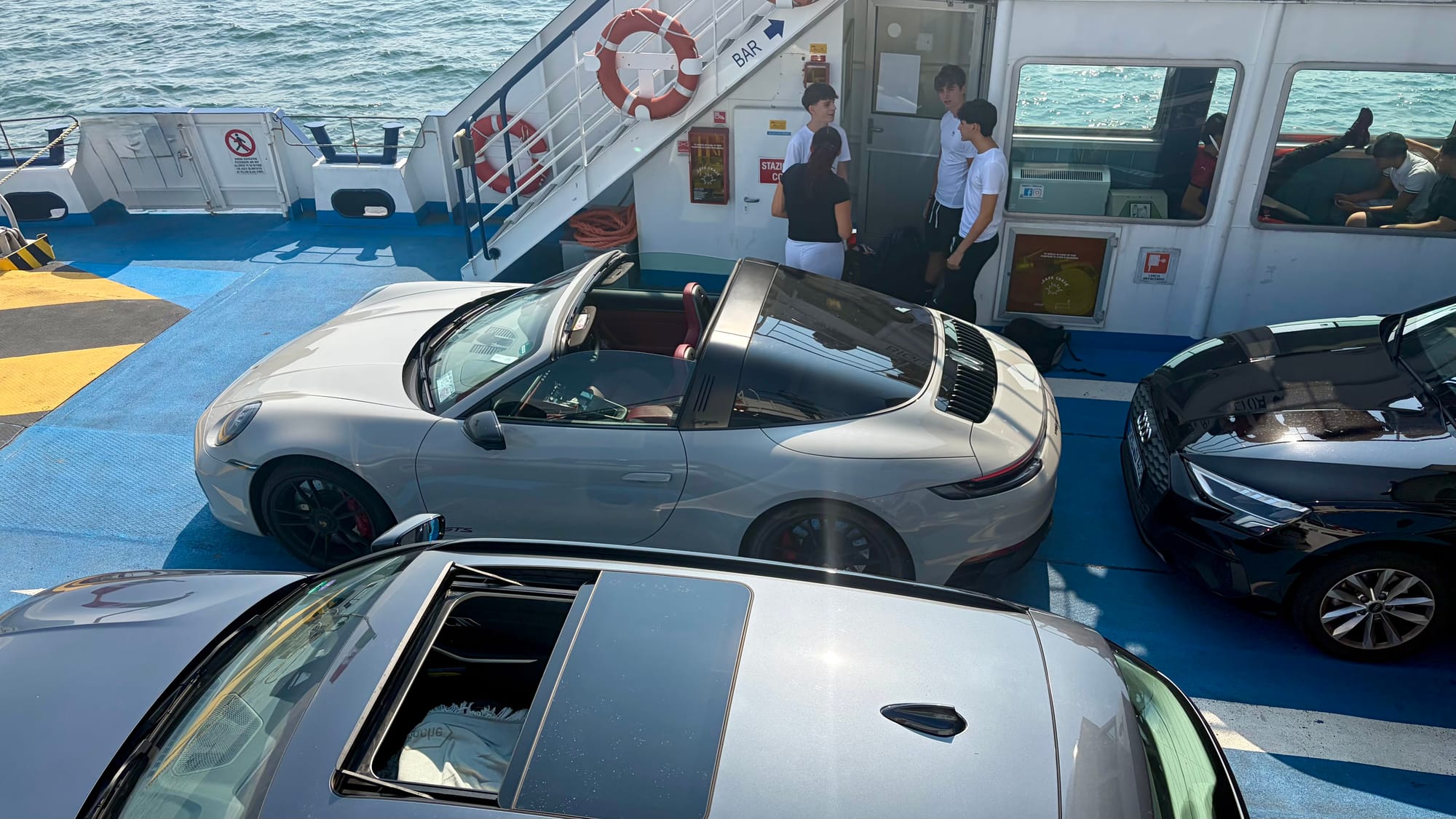 On board the small ferry crossing the lake