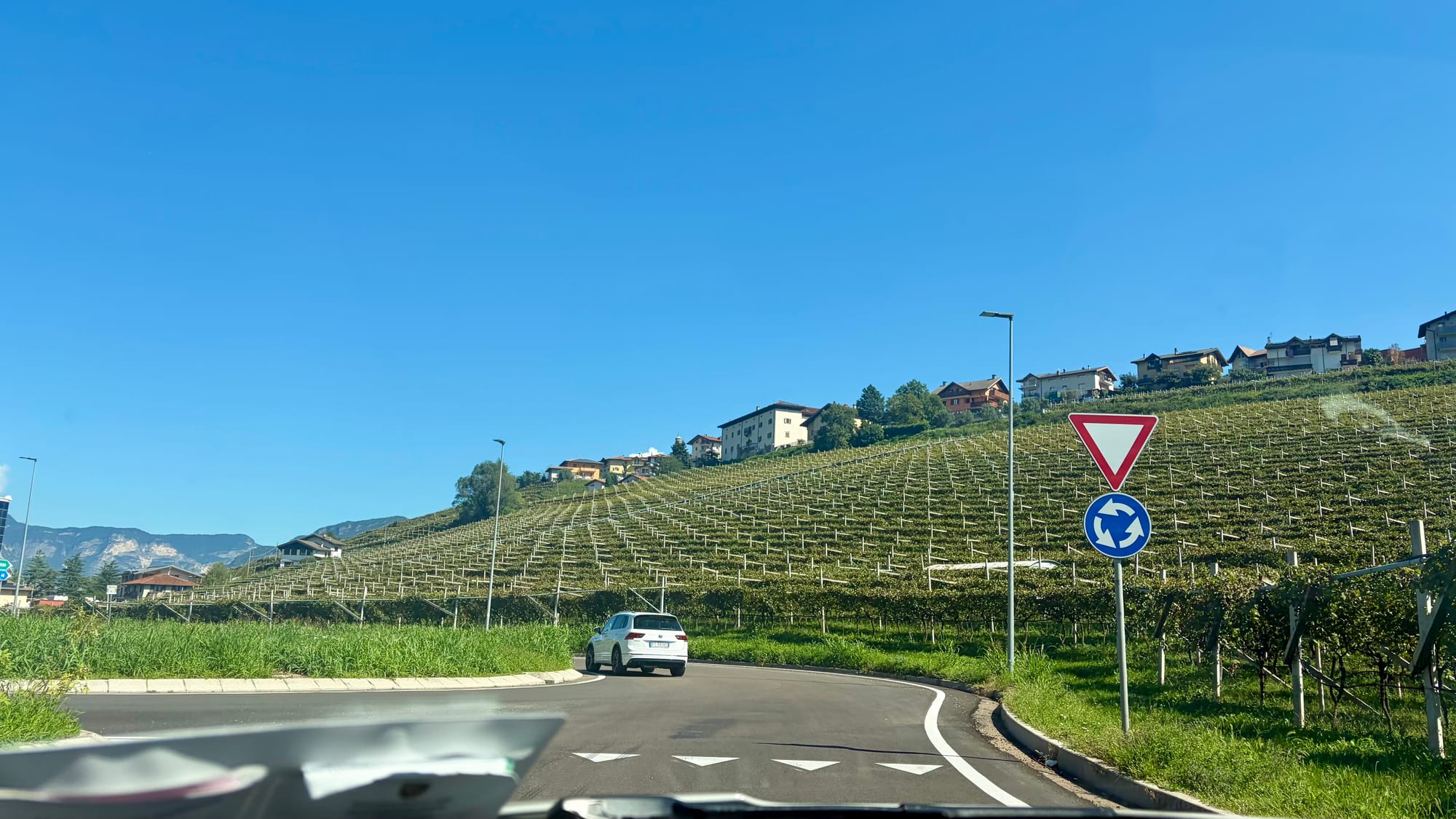 Passing Italian apple orchards
