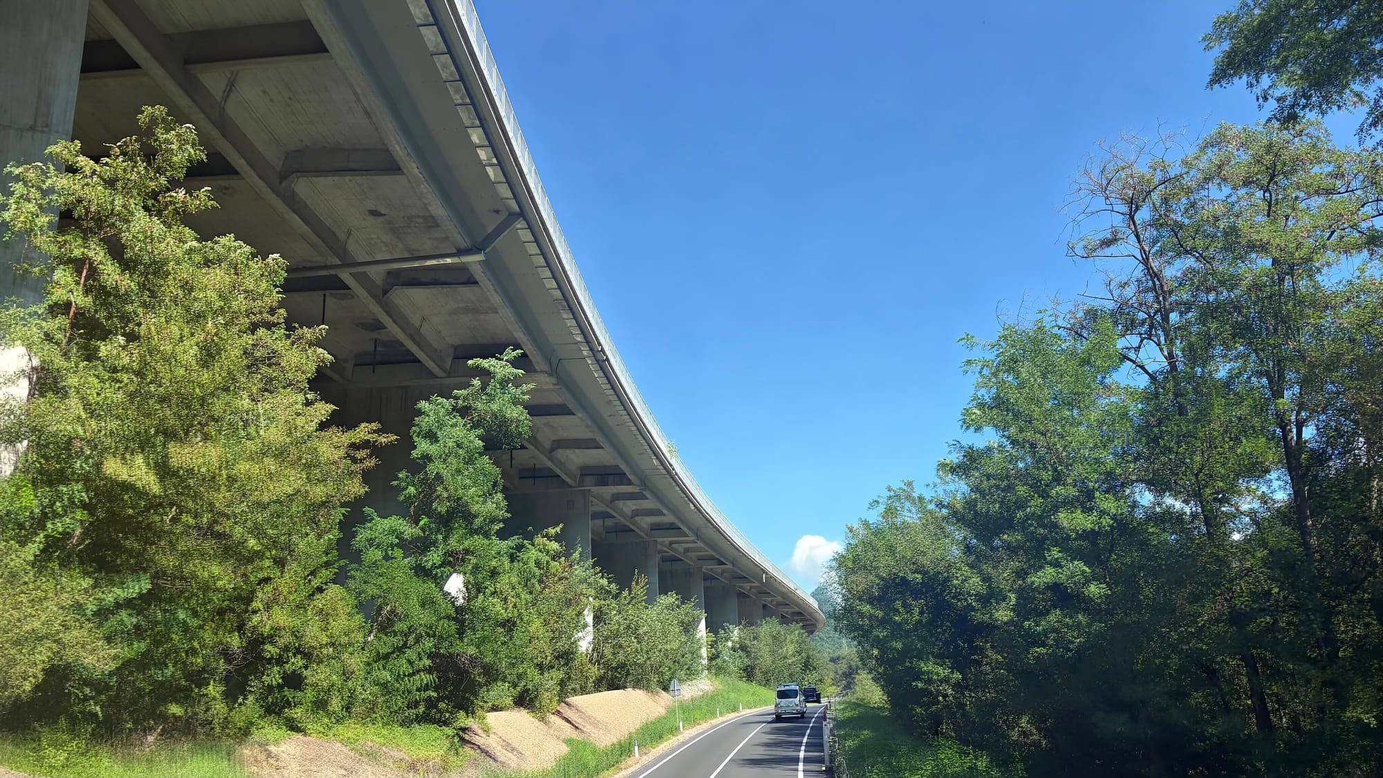 The motorway high above us