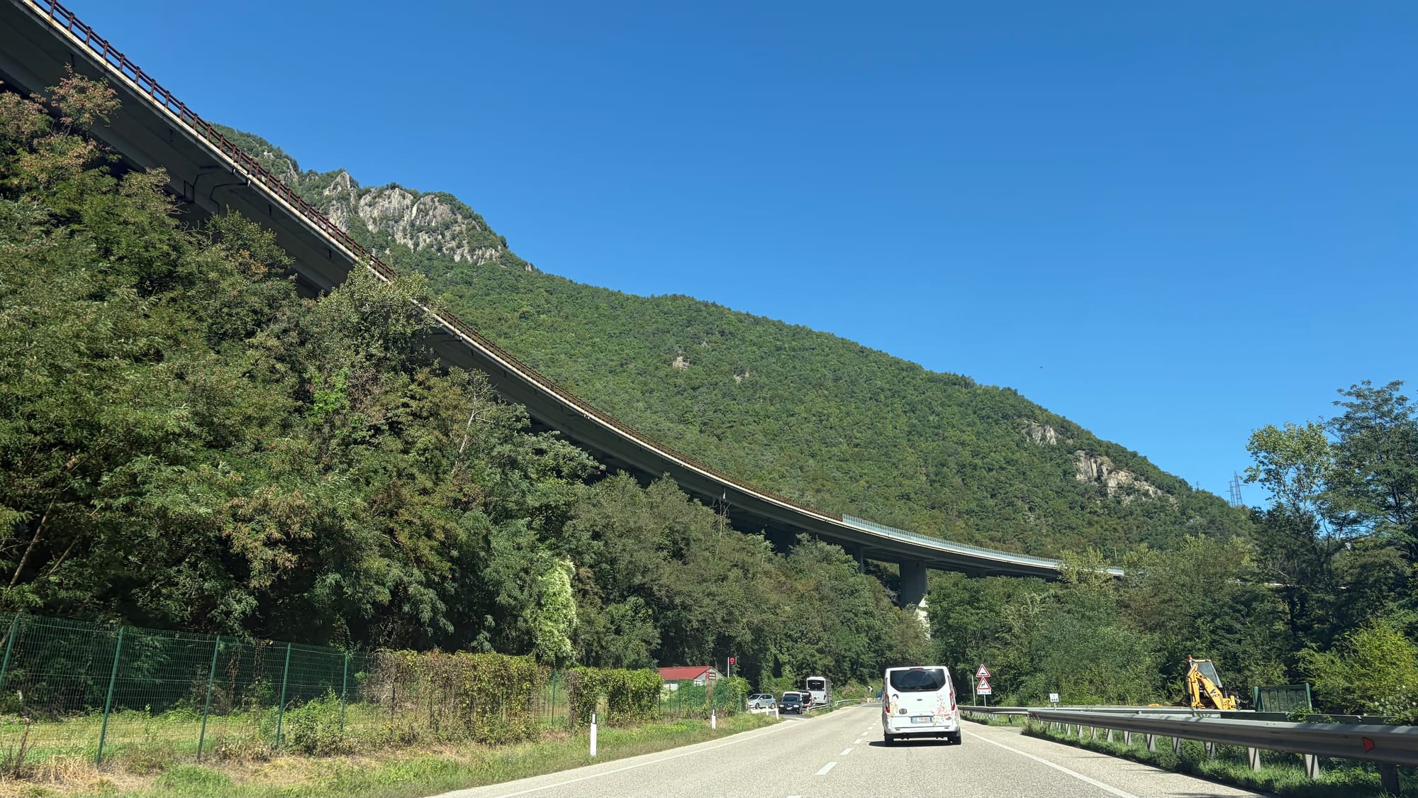 The motorway high above us