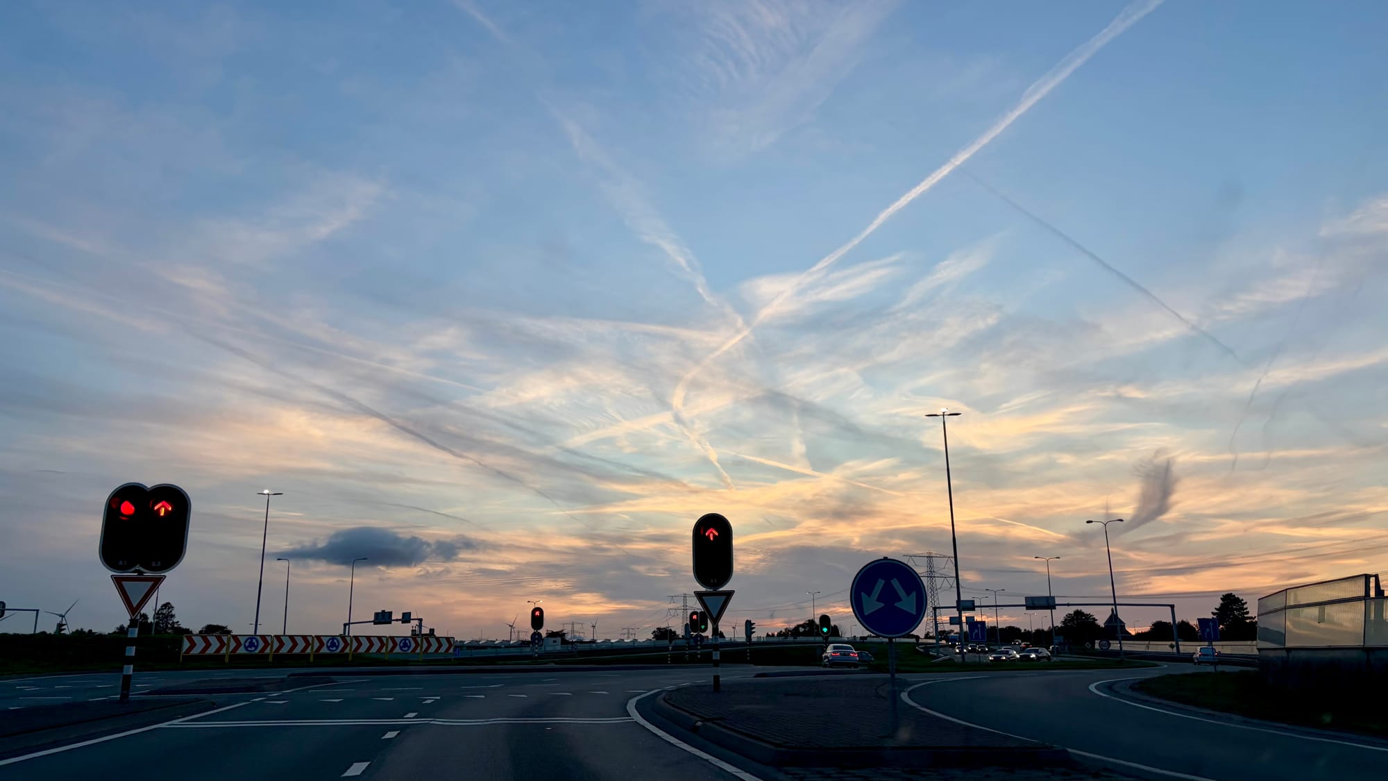 Passing aeroplanes against the darkening sky