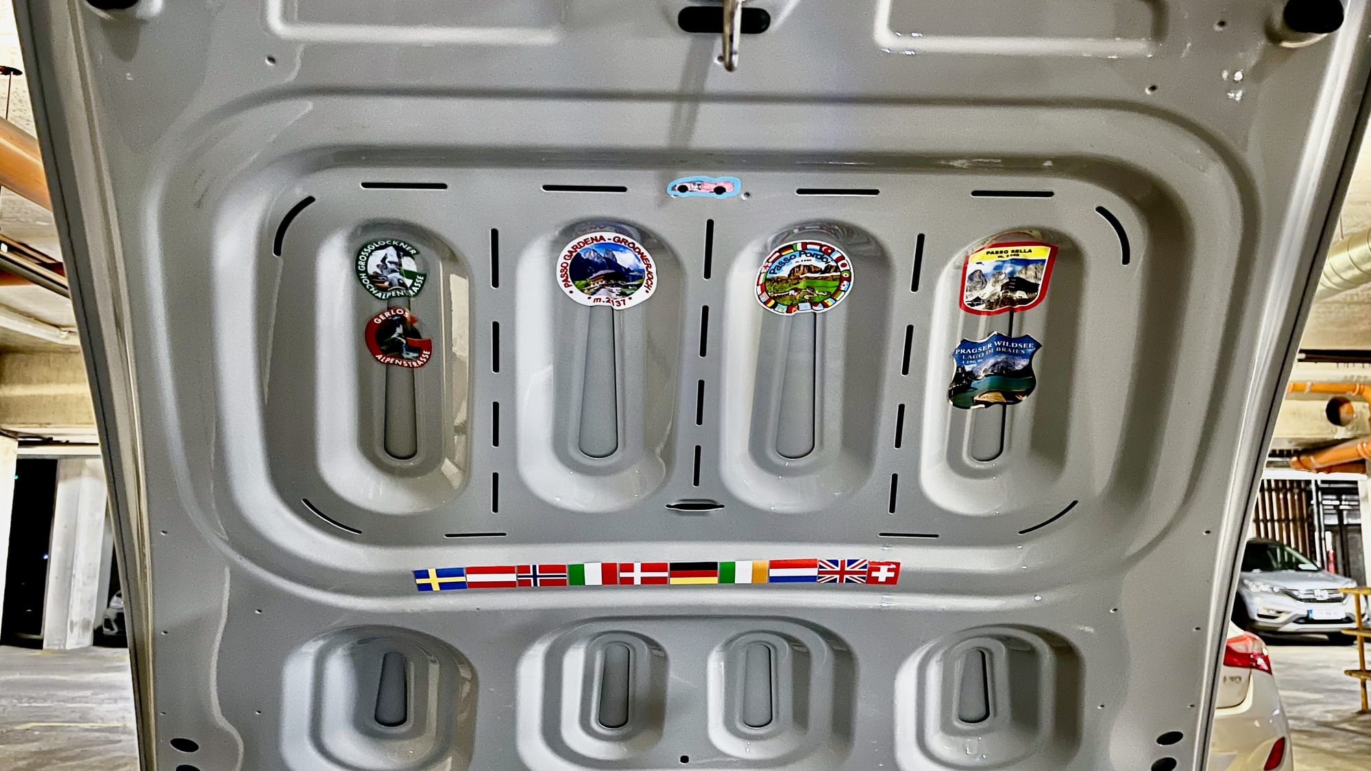 Mountain pass stickers and country flags